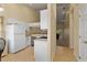 Bright kitchen with white cabinets, stainless steel appliances, and an open layout at 7196 N Plum Tree # 323, Punta Gorda, FL 33955