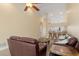 Bright living room with breakfast bar, sofa, and vaulted ceiling at 7196 N Plum Tree # 323, Punta Gorda, FL 33955