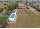 Inviting aerial view of a private pool area with a charming cabana, perfect for outdoor relaxation and entertainment at 7196 N Plum Tree # 323, Punta Gorda, FL 33955