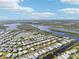 Expansive aerial view of charming waterfront community with meandering waterways at 724 Blackburn Blvd, North Port, FL 34287