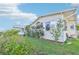 Well-maintained home exterior with neat landscaping, shows good curb appeal at 724 Blackburn Blvd, North Port, FL 34287