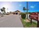 Tangerine Woods Clubhouse with pristine landscaping and ample parking at 861 Seabrooke Dr, Englewood, FL 34223