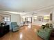 Open concept living room and dining room with hardwood floors, recessed lighting, and built-in shelves at 861 Seabrooke Dr, Englewood, FL 34223