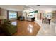 Spacious living and dining areas offer bright views and comfortable open concept design at 861 Seabrooke Dr, Englewood, FL 34223