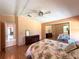 Spacious main bedroom featuring hardwood floors and ample natural light at 861 Seabrooke Dr, Englewood, FL 34223