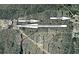 An aerial view showing the location of the property in relation to I-75, shopping, and restaurants at 1022 Waterside St, Port Charlotte, FL 33952