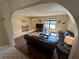 Bright living room with modern flooring, comfortable seating, and ample space for entertaining at 1022 Waterside St, Port Charlotte, FL 33952