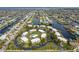 Expansive aerial view featuring the condo's location on a canal with neighborhood, water and lush greenery at 1080 Bal Harbor Blvd # 10C, Punta Gorda, FL 33950