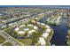 Aerial shot highlighting the property's access to the canal and its location within a community at 1080 Bal Harbor Blvd # 10C, Punta Gorda, FL 33950