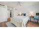 Bedroom with wood floors, large closets and a laundry area nearby at 1080 Bal Harbor Blvd # 10C, Punta Gorda, FL 33950