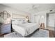 Elegant main bedroom with king bed, stylish decor, and a cozy atmosphere at 1080 Bal Harbor Blvd # 10C, Punta Gorda, FL 33950