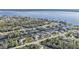 Aerial view of waterfront homes along canal with boat docks and scenic waterways at 12387 Minot Ave, Port Charlotte, FL 33981