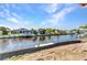 Scenic waterfront property with private dock and calm canal waters, perfect for boating at 12387 Minot Ave, Port Charlotte, FL 33981