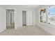 Bright bedroom space with closet and large window offering lots of natural light at 12387 Minot Ave, Port Charlotte, FL 33981