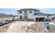New construction home exterior with mixed material facade and attached garage at 12387 Minot Ave, Port Charlotte, FL 33981