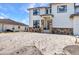 New home showcasing stone accents, a welcoming entrance, and spacious yard at 12387 Minot Ave, Port Charlotte, FL 33981
