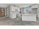 Bright kitchen featuring modern white cabinets and stone countertops, ready for customization at 12387 Minot Ave, Port Charlotte, FL 33981