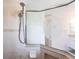 Modern shower features tiled walls and a decorative glass door with chrome fixtures at 12676 Bacchus Rd, Port Charlotte, FL 33981