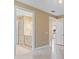 Hallway offering views of a bathroom and a kitchen, highlighting the home's layout at 1352 Raspberry Dr, North Port, FL 34289