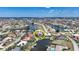 Waterfront property featuring a red tile roof, pool, and boat dock in a vibrant coastal community at 1425 Appian Dr, Punta Gorda, FL 33950