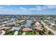 Waterfront neighborhood featuring single-Gathering homes with boat docks, canals, and tropical landscaping at 1425 Appian Dr, Punta Gorda, FL 33950