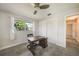Bedroom featuring a wooden desk, a window and double door closet at 1425 Appian Dr, Punta Gorda, FL 33950