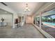 Spacious indoor entertaining area with views to the pool and outdoor space at 1425 Appian Dr, Punta Gorda, FL 33950