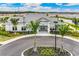 Aerial view of the community clubhouse featuring lush landscaping at 1490 Mableton Dr, Port Charlotte, FL 33953