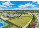 This is a well-maintained dog park with lush grass and fencing, part of a vibrant residential community at 1490 Mableton Dr, Port Charlotte, FL 33953