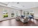 Lounge featuring comfortable seating, tables, chairs, and abundant natural light at 1490 Mableton Dr, Port Charlotte, FL 33953