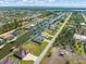 Elevated aerial view showcasing the waterfront homes along a canal in a residential community at 15618 Aqua Cir, Port Charlotte, FL 33981