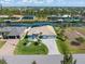 Waterfront home with a beautifully landscaped yard and private canal access in a quiet neighborhood at 15618 Aqua Cir, Port Charlotte, FL 33981