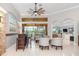 Open-concept living room featuring tile floors and a bright, airy atmosphere at 15618 Aqua Cir, Port Charlotte, FL 33981