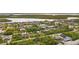 Aerial view of a residential community with direct canal access to the Gulf at 17342 Foremost Ln, Port Charlotte, FL 33948