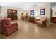 Spacious living area with neutral walls, tile flooring, and stylish furniture at 17342 Foremost Ln, Port Charlotte, FL 33948