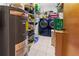 Utility room featuring a water heater, laundry machines, and plenty of storage space at 17342 Foremost Ln, Port Charlotte, FL 33948