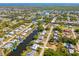 Waterfront home in a canal community featuring access to nature preserves at 18446 Burkholder Cir, Port Charlotte, FL 33948