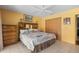 Warm, inviting bedroom with a lodge theme and tiled flooring at 18446 Burkholder Cir, Port Charlotte, FL 33948