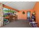 Wide carport with storage area and room for recreational equipment and vehicles at 18446 Burkholder Cir, Port Charlotte, FL 33948