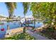 Waterfront home with private dock, boat lift, and access to scenic waterways at 18446 Burkholder Cir, Port Charlotte, FL 33948