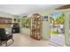 Bright living space with a display cabinet and views of the waterway at 18446 Burkholder Cir, Port Charlotte, FL 33948