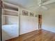 Bedroom showcasing built-in storage and bright, natural light at 19505 Quesada Ave # Ee202, Port Charlotte, FL 33948