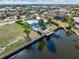Desirable waterfront property with a private dock, pool, and lush landscaping offering relaxing canal-front living at 1960 W Marion Ave, Punta Gorda, FL 33950