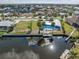 Waterfront property with private dock and pool, offering tranquil living with beautiful canal views and outdoor amenities at 1960 W Marion Ave, Punta Gorda, FL 33950