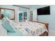 Bedroom featuring a bed and sliding glass door with access to the outside at 1960 W Marion Ave, Punta Gorda, FL 33950
