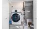 Clean laundry area with modern washing machine and dryer at 1960 W Marion Ave, Punta Gorda, FL 33950