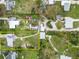 Aerial view of a property showing the layout, outdoor space and its position within the community at 212 Gulf Ave, Nokomis, FL 34275