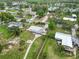 Overhead view featuring the home on a spacious lot with a fire pit at 217 Palm E Ave, Nokomis, FL 34275