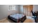 Cozy bedroom with a large closet, carpeted floors and a comfortable queen-sized bed at 2304 Bonn Ct, Punta Gorda, FL 33983