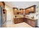 Spacious kitchen with granite countertops, stainless appliances, ample cabinet space, and a breakfast bar at 2304 Bonn Ct, Punta Gorda, FL 33983